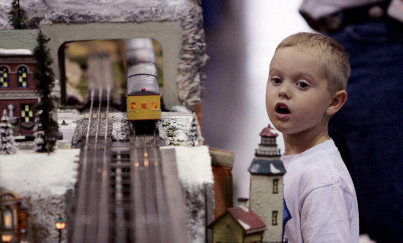 A Model Train Around the Christmas Tree